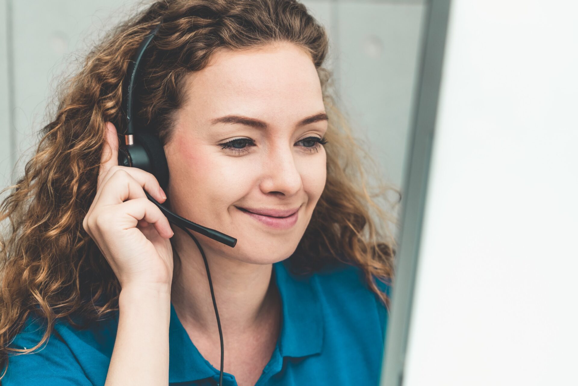 Business people wearing headset working in office to support remote customer or colleague. Call center, telemarketing, customer support agent provide service on telephone video conference call.